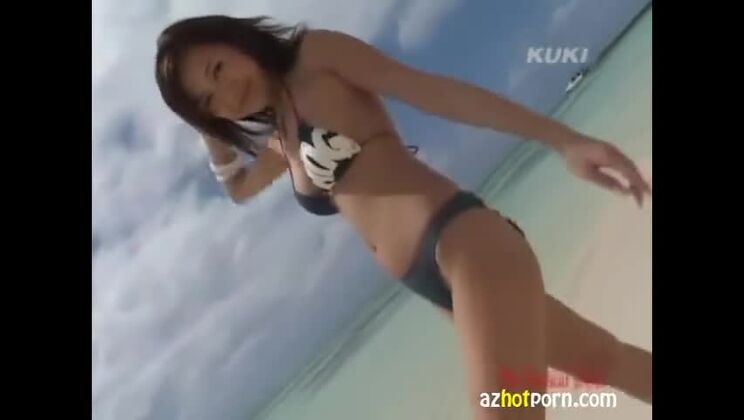 Beauteous asian wife on the seashore