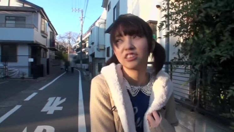 Winsome Japanese huzzy in public place