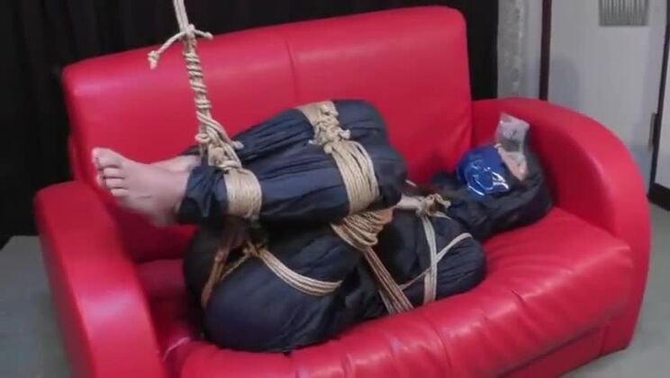 Asian Girl Bound in Rainwear